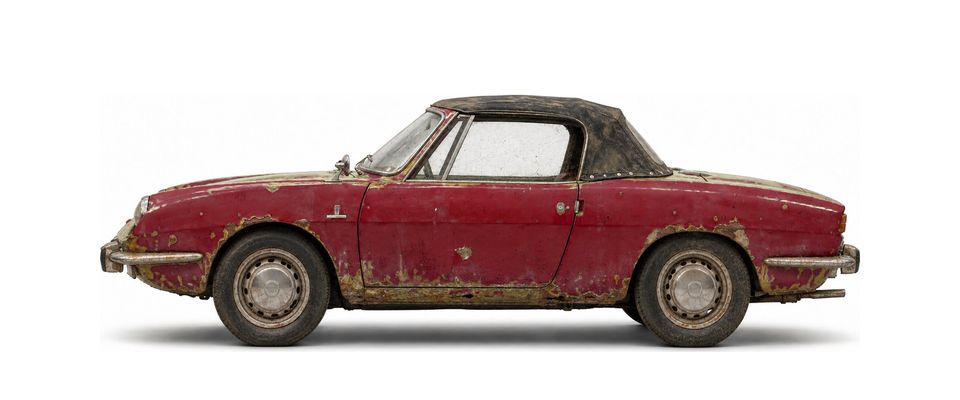 Rusty Fiat 850 Spider before restoration