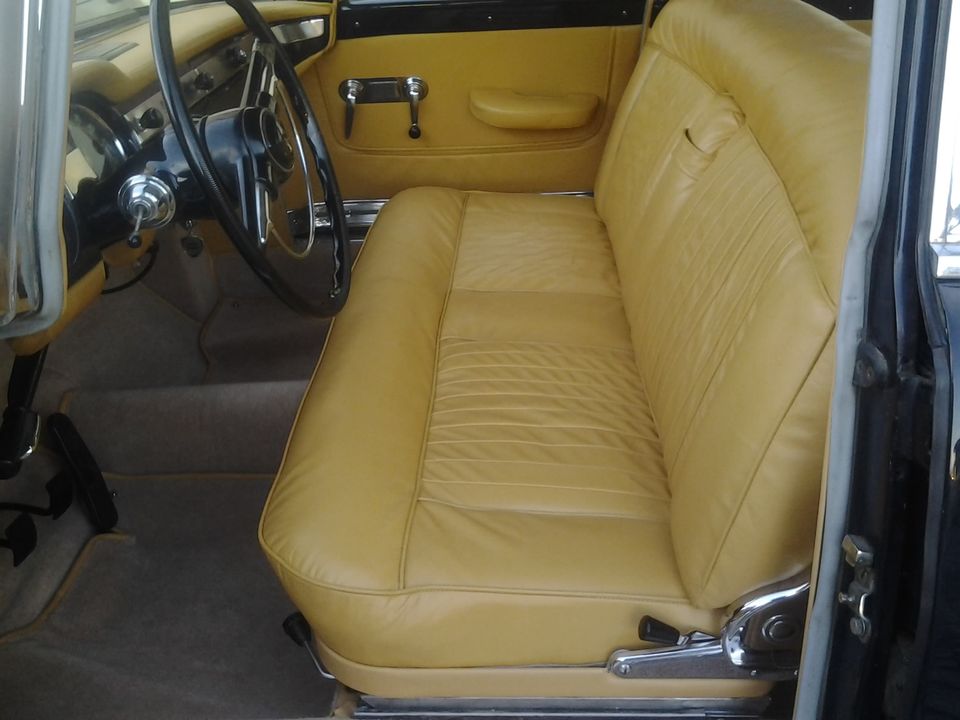 Mustard leather seats of a Lancia Flaminia